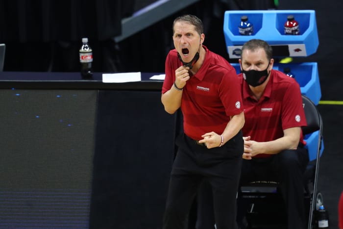 Arkansas Razorbacks head coach Eric Musselman yells from the sidelines against the Baylor Bears during the first half in the Elite Eight of the 2021 NCAA Tournament at Lucas Oil Stadium.